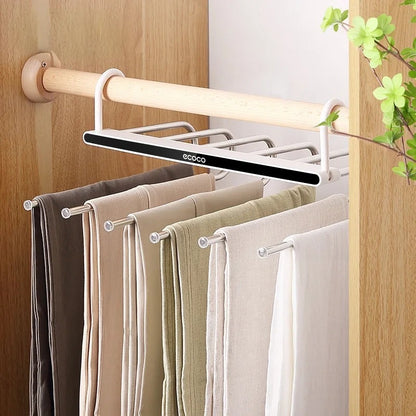 Closet storage hanger with multiple layers for organizing pants, scarves, and towels, designed for efficient wardrobe use.