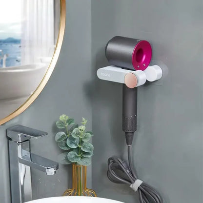 Elegant wall-mounted organizer featuring a dedicated slot for hair dryers and a cup for razors, makeup tools, or toothbrushes.

