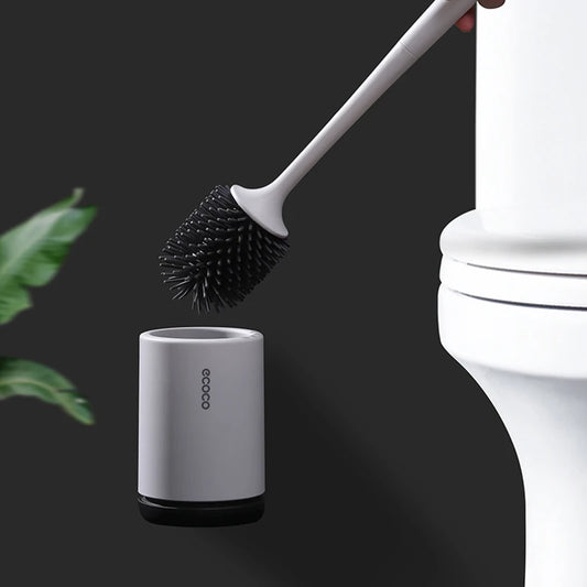 Durable toilet brush with dense silicone bristles, designed to reach under the rim for superior cleaning, with an anti-drip, ventilated base.

