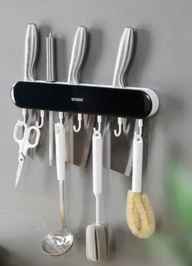 Stylish black Ecoco magnetic holder with hooks for knives, utensils, and a towel, perfect for a minimalist kitchen.

