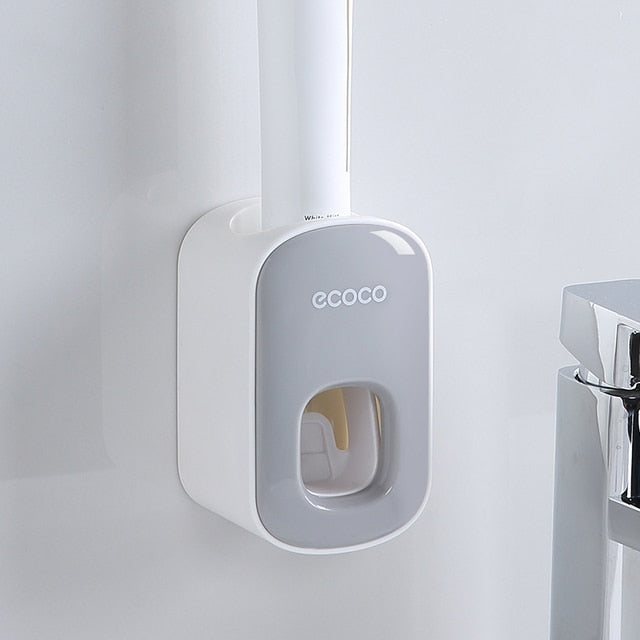 Compact and stylish black Ecoco toothpaste dispenser with a smooth wall-mountable design.