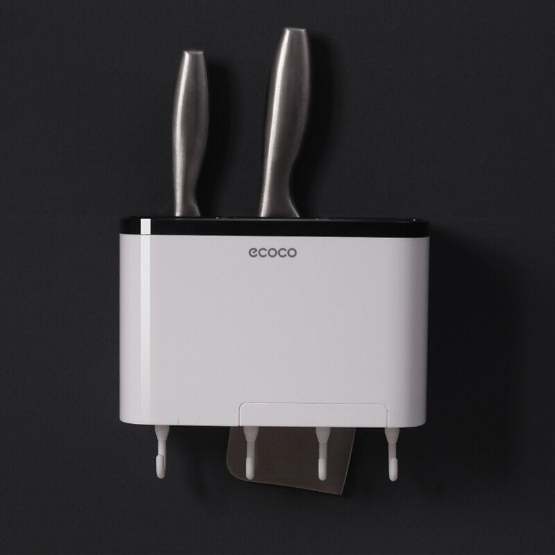 Minimalist Ecoco wall-mounted knife and utensil holder with secure slots and additional hooks for convenient kitchen storage.