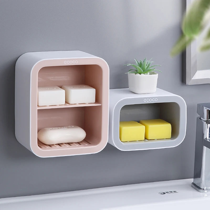 Modern pink wall-mounted soap organizer with dual shelves for efficient soap storage and bathroom space-saving design.

