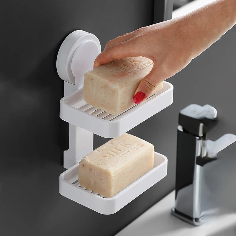 Wall-mounted Ecoco double-layer soap holder with a sleek white design, perfect for bathroom organization and drainage.
