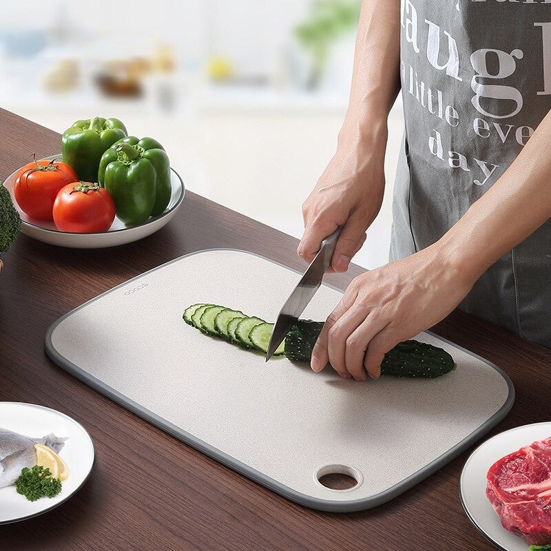 Premium Ecoco double-sided cutting board with anti-slip edges, designed for versatile kitchen prep and food safety.