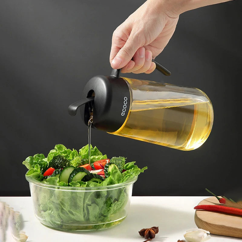 Stylish Ecoco glass oil and vinegar dispensers with black and gray lids, ideal for kitchen organization and seasoning control.

