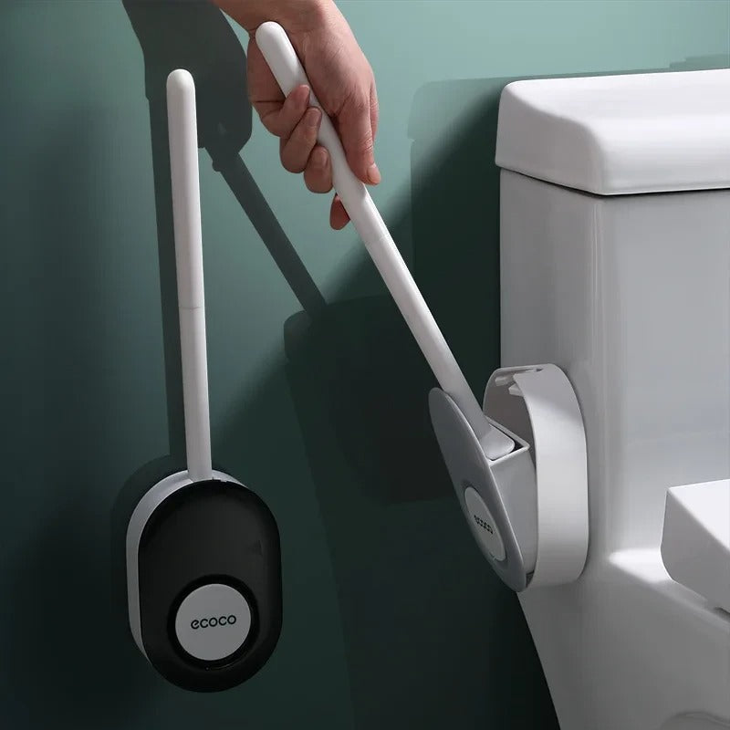 Stylish gray Ecoco toilet brush with a wall-mounted holder, ideal for keeping bathrooms clean and organized.

