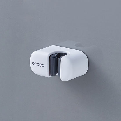 Ecoco gray toothpaste dispenser showcasing its dimensions of 113mm x 70mm x 60mm for space-efficient use.