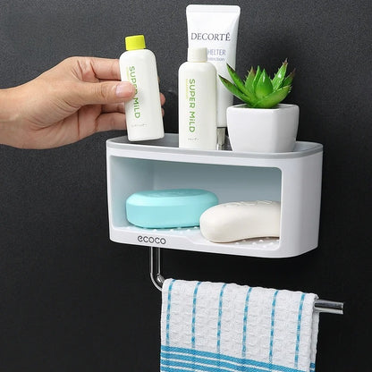 Stylish Ecoco wall-mounted organizer for toiletries, featuring a durable design and towel hook for maximum functionality.

