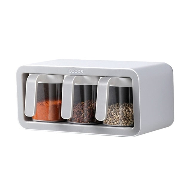 White Ecoco spice jar set with ergonomic handles for easy pouring and a sleek, compact kitchen design.

