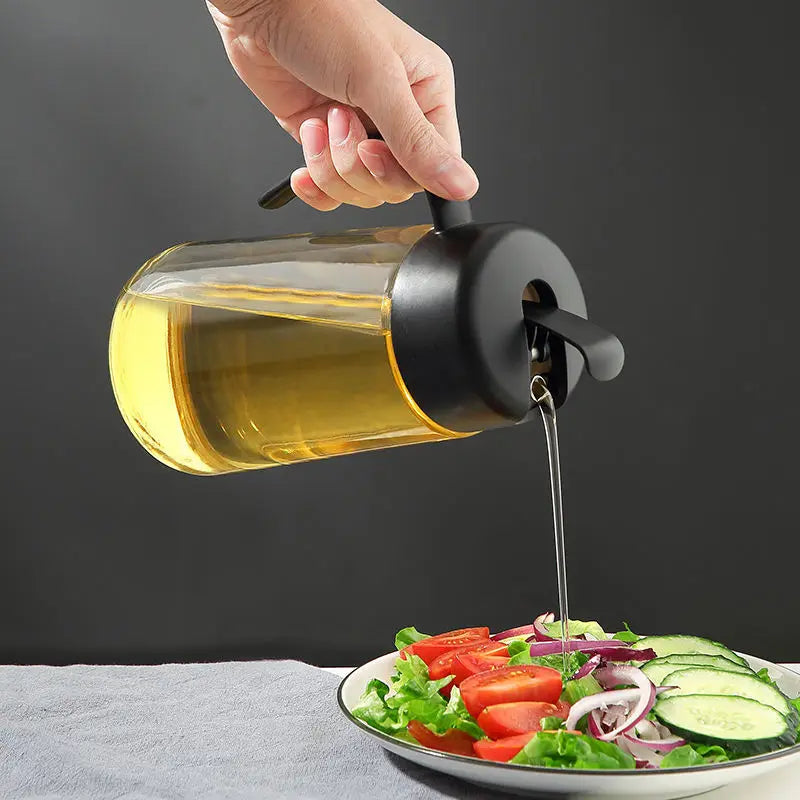 Transparent Ecoco oil bottle with a leak-proof spout and ergonomic handle, perfect for controlled pouring while cooking.