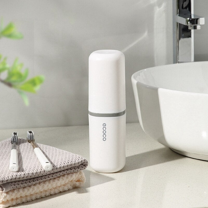 A white travel toothbrush holder that is easy to clean and matches any aesthetic. Lightweight and durable for extended use.