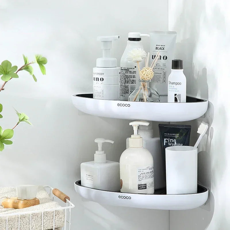  Minimalist Ecoco corner shelf with two tiers for organizing bathroom products like soap dispensers, bottles, and decorative items.