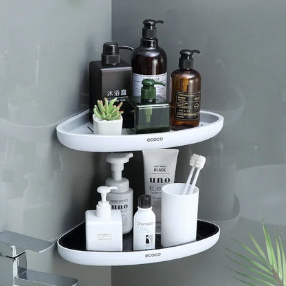 A double-tier corner shelf, ideal for organizing bathroom essentials like bottles, toothbrushes, and decorative items. Its clean design adds elegance to the bathroom space.