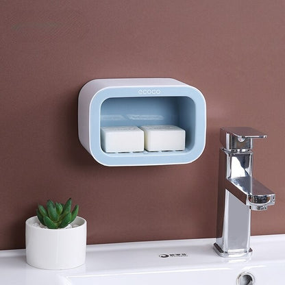 Elegant two-tone wall-mounted soap holders with separate compartments for soap bars and extra storage for compact bathrooms.







