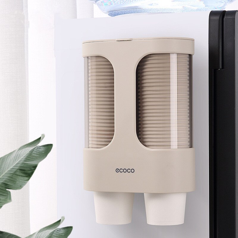 A convenient wall-mounted cup dispenser that allows users to grab a single disposable cup by pulling it downward. The sleek, modern design blends with various interior styles.