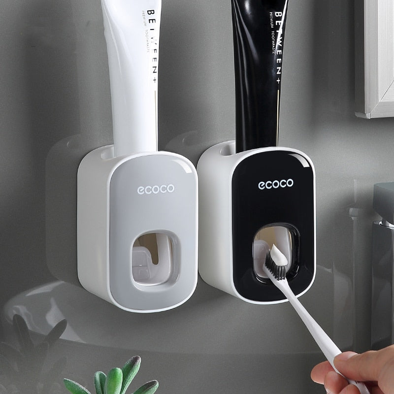 Modern gray Ecoco toothpaste dispenser with a compact design for easy wall installation in any bathroom.