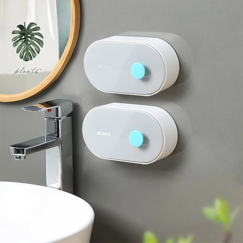 Innovative soap holder with a drainage system and push-button cover. Wall-mounted for a sleek, space-saving design that keeps your soap dry and mess-free.

