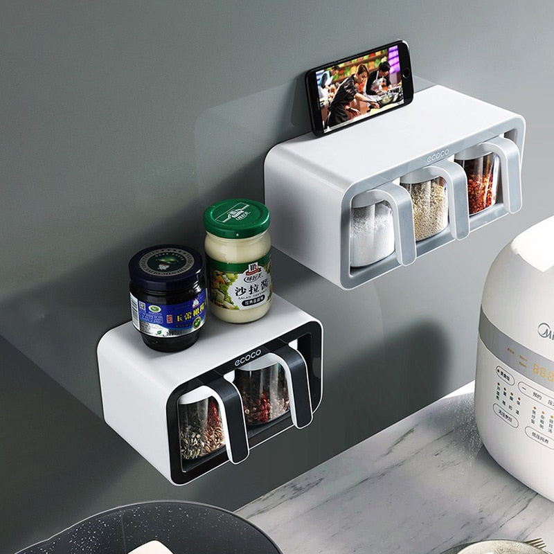 Modern Ecoco wall-mounted spice organizer with clear storage containers and a top shelf for extra kitchen storage.

