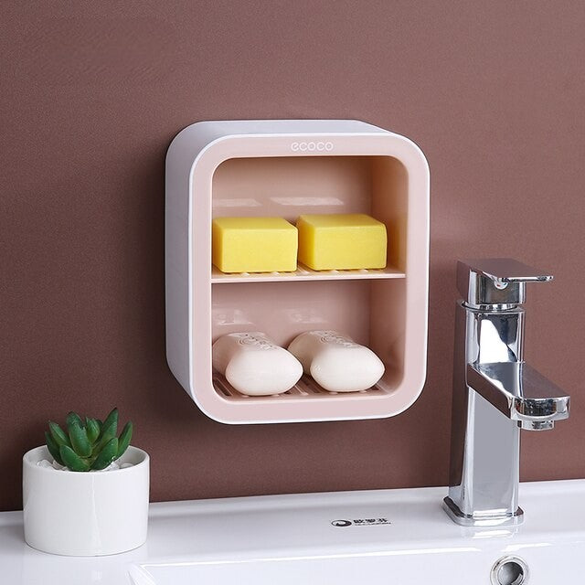 Durable Ecoco organizer with separate compartments for soaps and other essentials, available in soft pastel tones.

