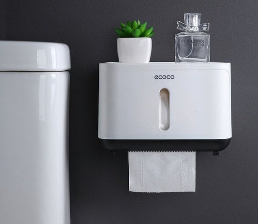 Sleek Ecoco wall-mounted toilet paper dispenser with a built-in storage shelf for bathroom essentials.

