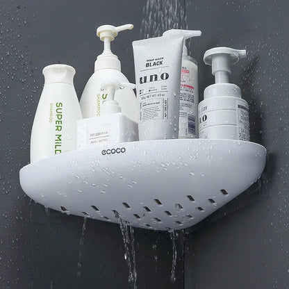 A sleek, wall-mounted corner shelf designed for showers. It features drainage holes for water to flow through, keeping toiletries dry and clean. Perfect for storing shampoos, conditioners, and body wash.