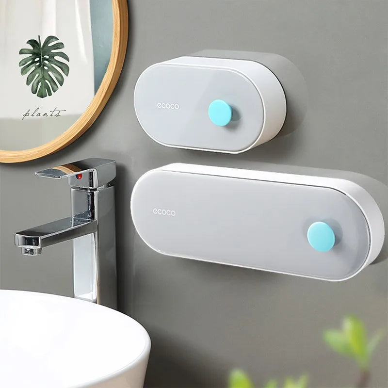 Durable and waterproof tissue dispenser with a modern wall-mounted design. Features a storage shelf for extra convenience, ideal for bathrooms and kitchens.

