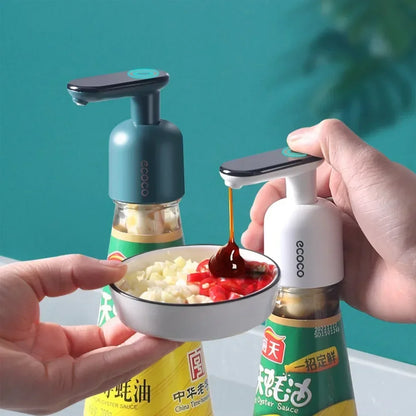 Automatic touch-activated soy sauce dispenser with a sleek black lid and a white body. Designed for controlled, spill-free pouring.

