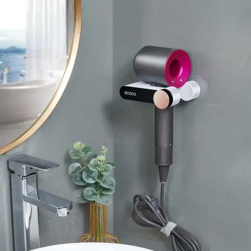 Compact and stylish wall-mounted stand with a firm grip for hair dryers, plus extra space for beauty essentials.

