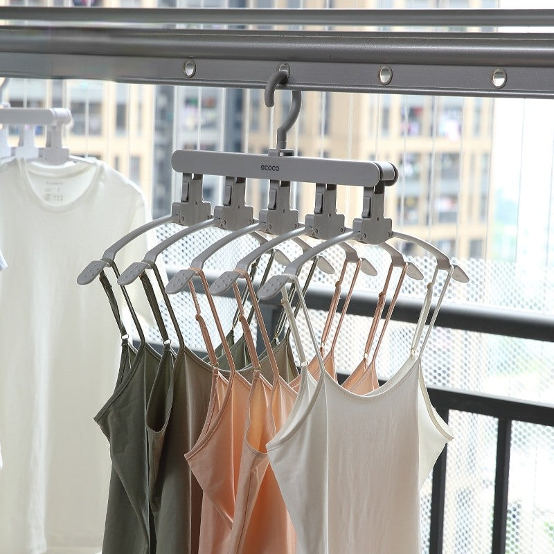 Compact Ecoco clothes hanger set for optimizing closet space, featuring a sturdy hook and multiple attachment points.