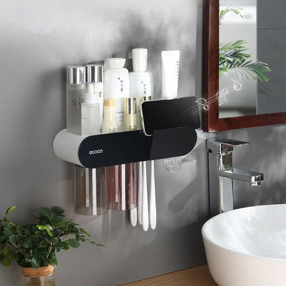 Modern bathroom storage rack with multi-functional compartments for toothbrushes, cups, and toiletries.